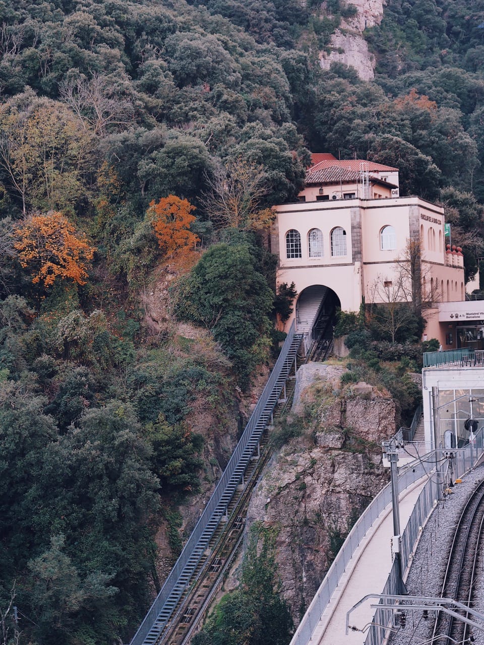 funicular track leading up to a station on the mountain